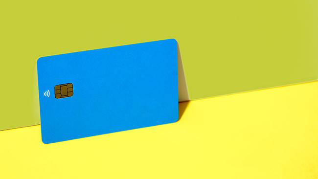 blue credit card yellow background
